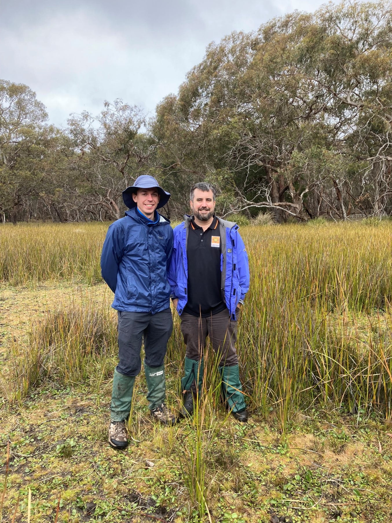 Callum and Jayden stand side-by-side at a a wetland near Stony Creek Reservoir (approx. 40km from the nearest estuary) which was going to be watered from the nearby reservoir for the first time.